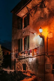 Dilapidated house wall with clothesline, house, evening mood, evening, urban, atmospheric, light,