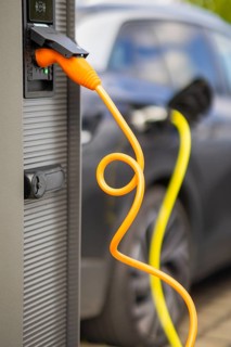 Electric cars at charging stations, Dresden, Saxony, Germany, Europe
