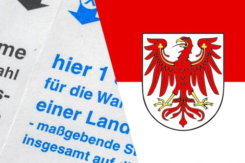Symbolic image state election in Brandenburg: Flag of Brandenburg and close-up of a ballot paper.