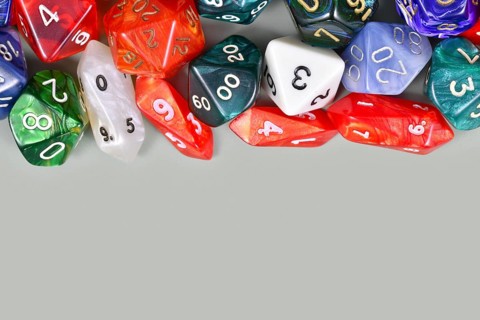Different colorful roleplaying RPG dice with copy space