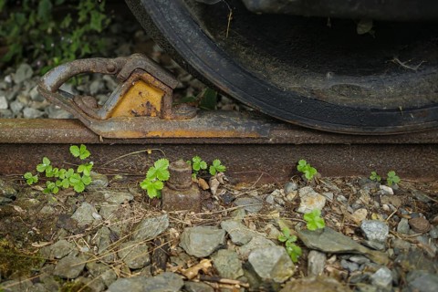 Symbolic photo on the subject of standstill in railway traffic. A brake shoe stands in front of the