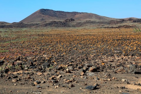 Rocky volcanic badlands 'malpais' landscape, Malpaís Grande national park, Fuerteventura, Canary
