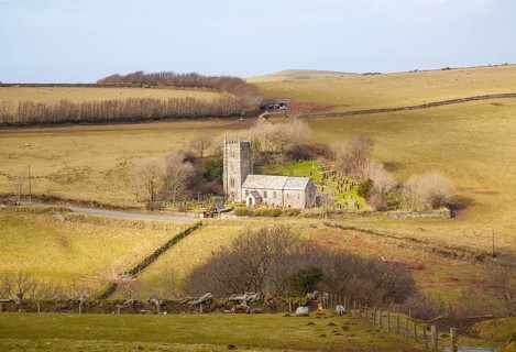 St Brendan's parish church standing alone in Exmoor national park hills, Brendon, Devon, England,