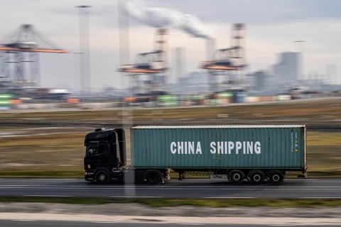 Container lorry, bringing containers to Euromax Container Terminal, the seaport of Rotterdam,