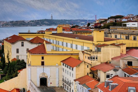 View over Alfama and the Tagus river, Portugal, Europe