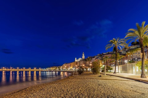 Beach and the old town of Menton by night, Mediterranean Sea, Côte d'Azur, France, Europe