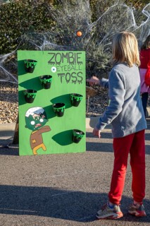 Lakewood, Colorado, Families enjoy the pre-Halloween Haunted Trail event at Bear Creek Lake Park. A