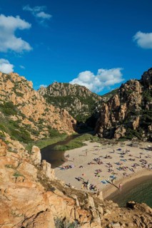 Red rocks and picturesque beach, Spiaggia di Cala li Cossi, Costa Paradiso, Sardinia, Italy, Europe