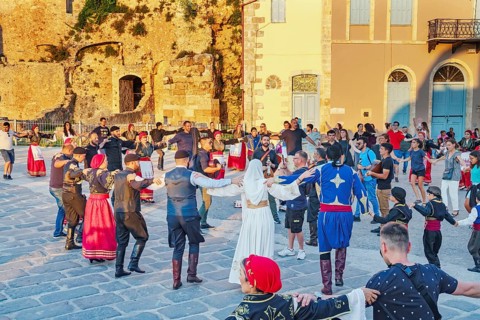 Group of people performing traditional Greek dance, Chania, Crete, Greek Islands, Greece, Europe