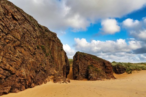 Cliffs on the sandy beach, Boyeeghter Strand, Murder Hole Beach, Sheephaven Bay, Rosguill