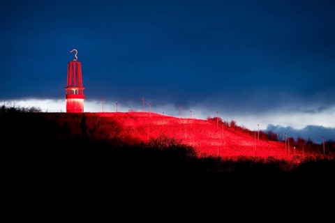 Artwork Illuminated at night with red illuminated slagheap Rheinpreussen by Otto Piene, Moers, Ruhr