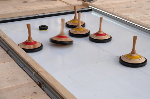 Curling on an artificial ice rink at a Christmas market, Erlangen, Middle Franconia, Bavaria,