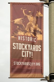 Oklahoma City, Oklahoma, A banner on a light pole in Stockyards City. The area has stores and