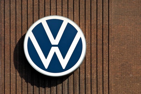 Large VW logo on the old cogeneration plant, Volkswagenwerk Wolfsburg, main plant of Volkswagen AG,
