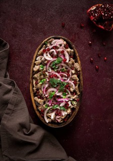 Kuchmachi, Traditional Georgian cuisine, chicken giblets appetizer, with spices and pomegranate