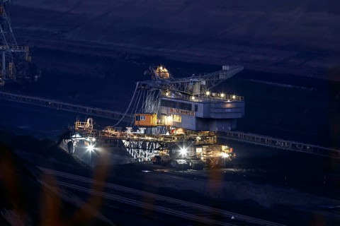 Lignite excavators extract coal in the Welzow open-cast mine, operated by LEAG. The lignite is