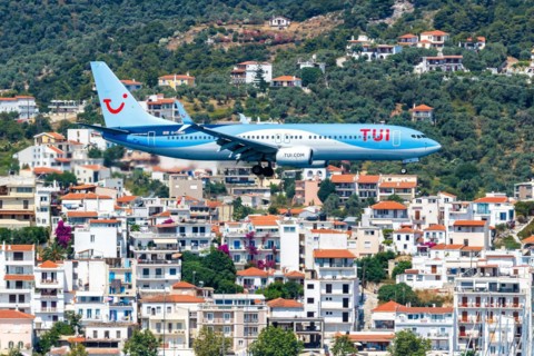 A TUI Airways Boeing 737-800 aircraft with the registration G-TAWO at Skiathos Airport, Greece,