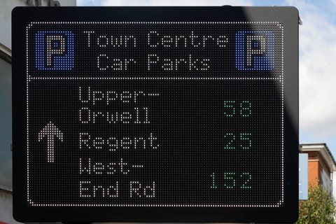 Electronic information sign about car parks and available spaces in town centre, Ipswich, Suffolk,