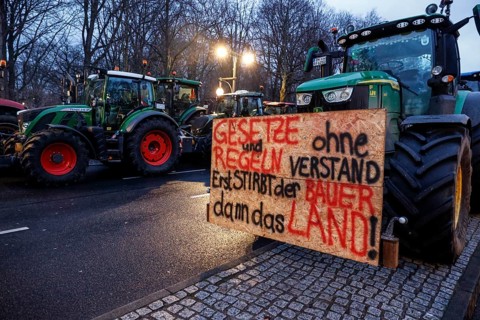 Thousands of farmers demonstrate with their tractors against the planned cancellation of the