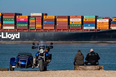 Container freighter Al Manamah, of the shipping company Hapag-Lloyd, in the harbour entrance of the