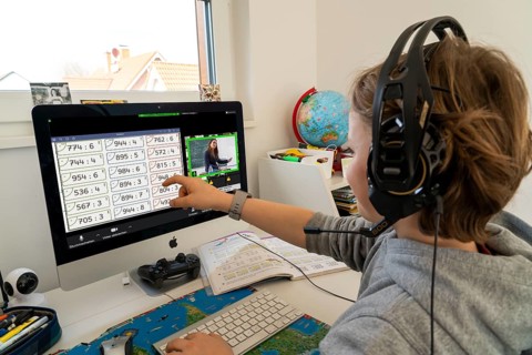 Young, primary school pupils, home learning, doing schoolwork, distance learning, virtual