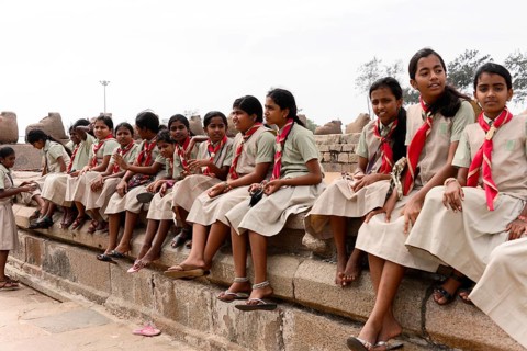 School class visiting the coastal temple of Mahabalipuram, Mamallapuram, Mahabalipuram, Tamil Nadu,