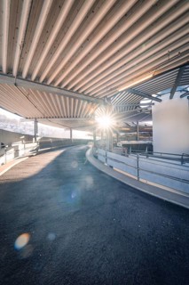 A spiral path in a multi-storey car park with bright sunlight, Kaufland Calw multi-storey car park,