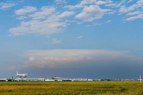 Overview Munich Airport with Runway South with thundercloud, storm cloud, rain cloud, storm, Munich