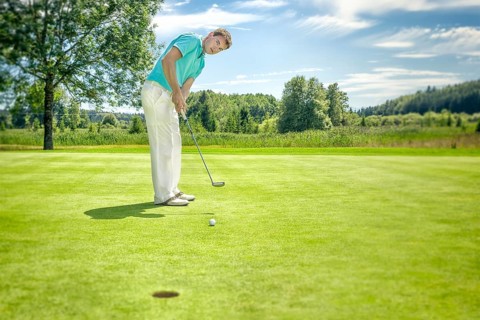 A picture of a young male golfer