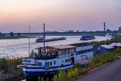 Restaurantschife at the Rhine harbour on Robert-Lehr-Ufer, in Düsseldorf, in the background the