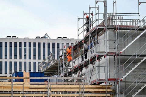 Building site scaffolding construction worker