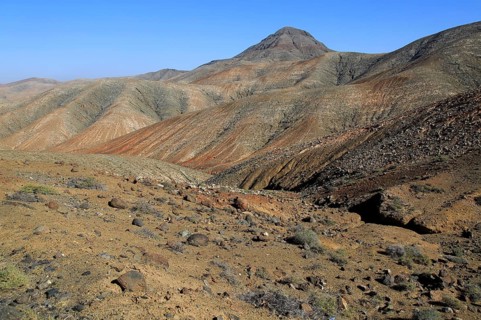 Bare moon-like arid landscape in mountains between Pajara and La Pared, Fuerteventura, Canary