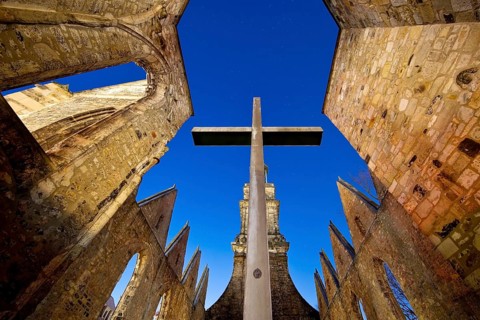 Aegidienkirche with apsis cross in the evening, not rebuilt, memorial to the victims of war and