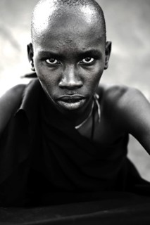 Portrait of a teenage boy from the Njemps tribe, Kenya. He is following his initiation rite. Once