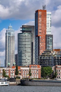 Harbour basin of the Maashaven, inland waterway port, jetties, residential buildings in the Kop van