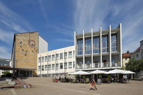 Modern town hall, street pub with people, Adenauerplatz, Friedrichshafen, Obersee, Lake Constance,
