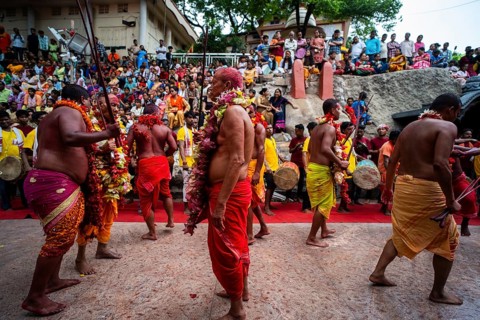 GUWAHATI, INDIA, AUGUST 19: Priests dance in the beat of Dhol (Drum) during the annual