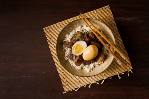 Stewed eggs, with pork belly, and rice, chinese food, homemade, selective focus, rustic, no people