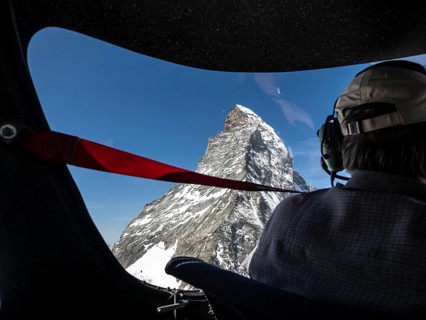 Flight in small aircraft in the swiss alps, view towards peak of Matterhorn, Switzerland, Europe