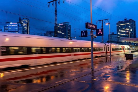 ICE train, train traffic, city centre skyline, Essen central station, North Rhine-Westphalia,