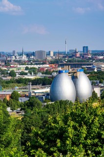 View of Dortmund city centre from the Deusenberg spoil tip, with the digestion towers of the Deusen