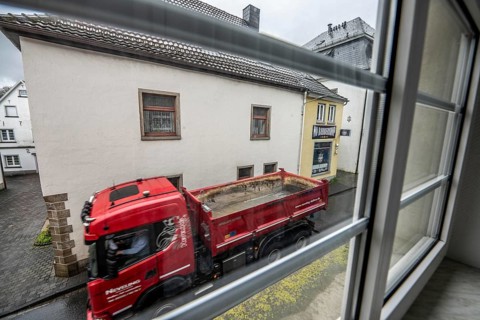 City centre traffic, lorry driving through the town of Breckerfeld, narrow passage in Frankfurter