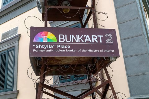 Sign for Bunk'art 2 former anti-nuclear bunker in city centre of Shtylla Place, Tirana, Albania,