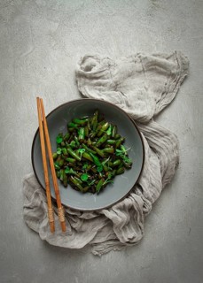 Fried bean pods, in soy sauce, with sesame seeds, homemade, no people