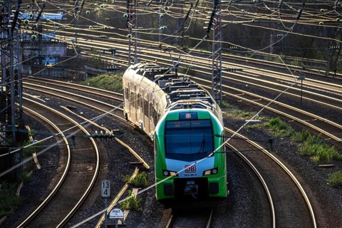 S-Bahn train on the tracks, railway layout, railway line west of the main station of Essen, North