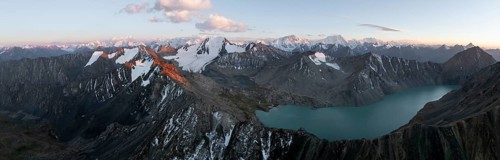 Evening mood, mountain panorama, aerial view, 4000 metre peak with glacier, mountain pass and