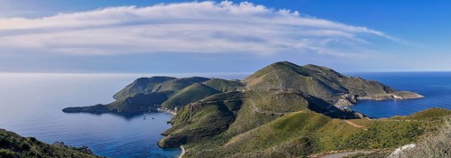 Wide panoramic view of a hilly island chain with clear blue sea, southern tip, Mani peninsula,