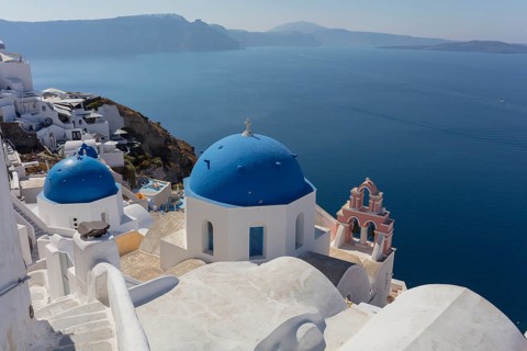 Santorini, Oia, blue domes, churches Agios Spyridon Agios Anastasis from above, Cyclades, Greece,