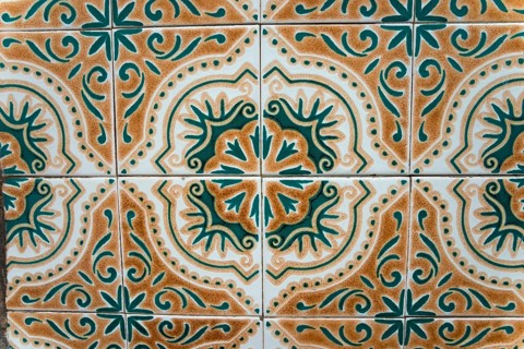 Detailed traditional tile pattern in shades of green and brown, azulejos, Portugal, Europe