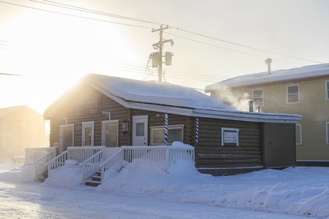 Historic building, fog, ice fog, snow, winter, cold, sun, smoke, Dawson City, Yukon, Canada, North